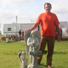 David Connor in front of FEMA trailer