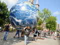 Protesters carry giant globe