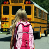 Girl and school bus 