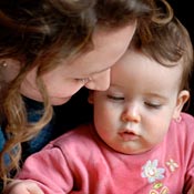A woman with a 10-month-old baby 