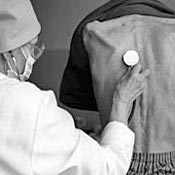 Doctor treats tuberculosis patient in Ukraine 