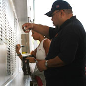 Visitors sign beams for memorial 