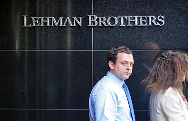 
                A man walks out of Lehman Brothers headquarters in New York City.
                                    (Mario Tama/Getty Images)
                                