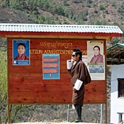 Bhutanese man makes a cell-phone call 