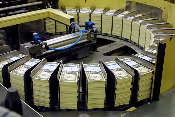 
                Rows of dollar bill notes at the Bureau of Engraving and Printing in Washington, D.C.
                                    (Alex Wong/Getty Images)
                                