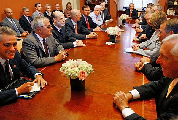 
                Federal Reserve Chairman Ben Bernanke, Treasury Secretary Henry Paulson, and Securities and Exchange Commission Chairman Christopher Cox join leaders from the House and Senate for a meeting at the U.S. Capitol on Thursday.
                                    (Chip Somodevilla/Getty Images)
                                