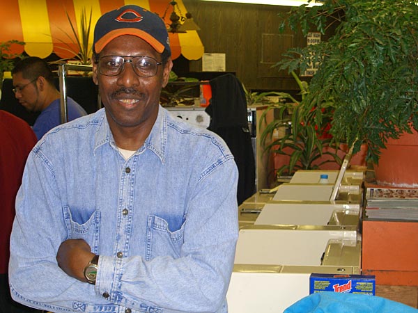 
                Lorenzo Smith at the Washing Well coin laundry
                                    (Adriene Hill)
                                
