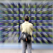 Look at a stock price board 