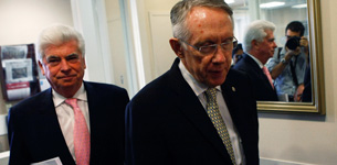 Senators Harry Reid Chris Dodd work on the bailout