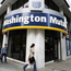 People walk past a Washington Mutual bank
