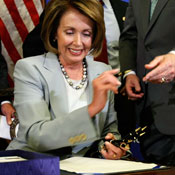 Speaker Pelosi signing the rescue plan 
