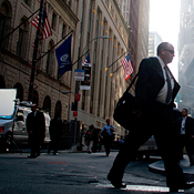 People walking in front of Wall Street 