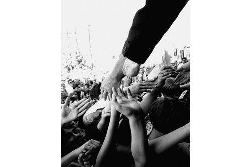 
                    Robert Kennedy reaches to the crowd during his campaign in 1968.
                                            (Steve Shapiro)
                                        