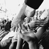 Robert Kennedy reaches to the crowd in 1968
