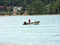A man fishes in Lake Phalen