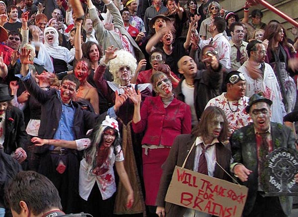 
                The annual Zombiecon festival in New York City this year adopted a financial crisis theme. Participants dressed as zombie bankers, undead brokers and CEOs and gathered in the Wall Street district. Here they pose for a shot on the steps of bankruptcy court.
                                    (Jim Glaser)
                                