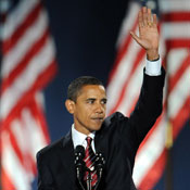 Obama waves at victory rally 