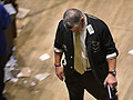 A trader works on the floor of the NYSE