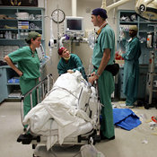 Medics in a CAT scan room in Miami, Fla. 