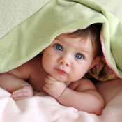 Baby under blanket 