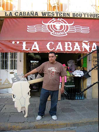 
                La Cabana sells cowboy gear: belts, buckles, boots. Owner Jose Manuel de Luna's shop caters to people he calls "tourists" -- Mexican immigrants in the U.S. who are in Jerez to visit relatives who live in the town.
                                    (Dan Grech /  Marketplace)
                                