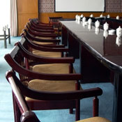 Boardroom with empty chairs 