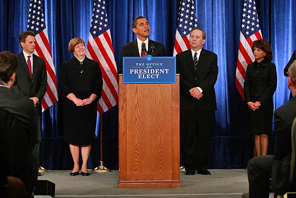 
                President-elect Barack Obama introduces his economic team during a press conference at the Hilton Hotel in Chicago. From left, Timothy Geithner, president of the New York Federal Reserve Bank, as Treasury secretary; Christina Romer, an economist at the University of California-Berkeley, chair of the Council of Economic Advisers;  Lawrence Summers, former Treasury secretary under President Clinton, director of the National Economic Council; and Melody Barnes, executive vice president for policy at the Center for American Progress, director of his White House Domestic Policy Council.
                                    (Scott Olson/Getty Images)
                                