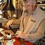 Jeff Taylor works on Sean Cole's belt