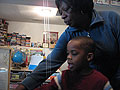 Carolyn with Ishmael at the board