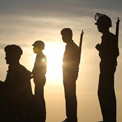 Indian policemen patrol Mumbai's Oberoi Trident 
