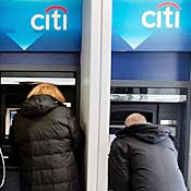 People withdraw money from Citibank ATMs 