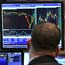 Trader works on fthe floor of the NYSE