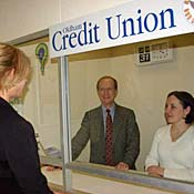 People in a credit union offfice.