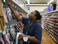 Stocking shelves at Wal-Mart