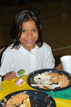 
                Kiara Lopez at the Los Angeles Boys and Girls Club's Thanksgiving dinner.
                                    (Marketplace)
                                