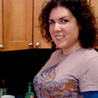 Sora Golob making latkes