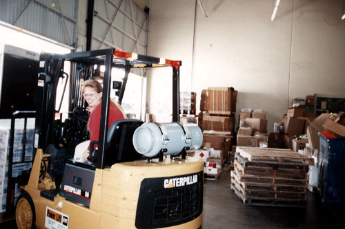
                    Jonathan's mom, Rosanna Leisure, driving a forklift sometime in the early 1990s.
                                            (Courtesy Jonathan Menjivar)
                                        