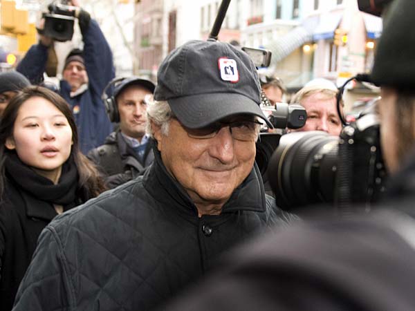 
                Bernard Madoff walks down Lexington Avenue to his apartment in New York City.
                                    (Don Emmert/AFP/Getty Images)
                                
