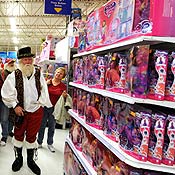 A Santa student visits Toys R Us 