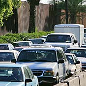 Cars in line at US/Mexico border 