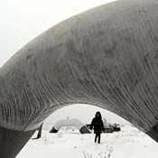 Woman passes by Ukrainian gas pipe 