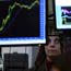 A trader observes stocks at the NYSE