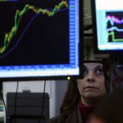 A trader observes stocks at the NYSE 