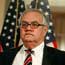 Rep. Barney Frank listens to reporter questions