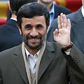 Iranian President Mahmoud Ahmadinejad waves. 