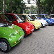 A row of Reva electric cars 