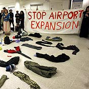 Protesters at Manchester Airport in England 