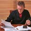 Borrower looks at loan papers.