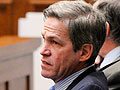 Norm Coleman listens to testimony