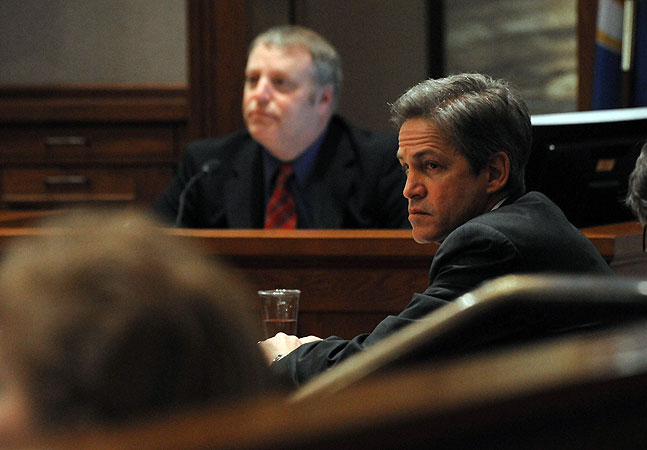 Norm Coleman listens to Attorney Joe Friedberg question Deputy Secretary of State Jim Gelbmann about absentee ballots.